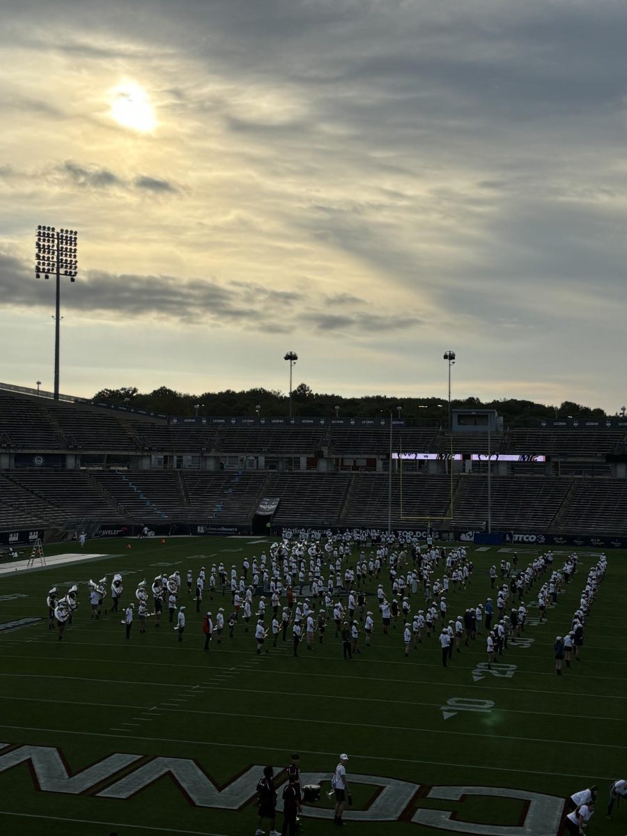 UCONN marching band performing pre-game show.