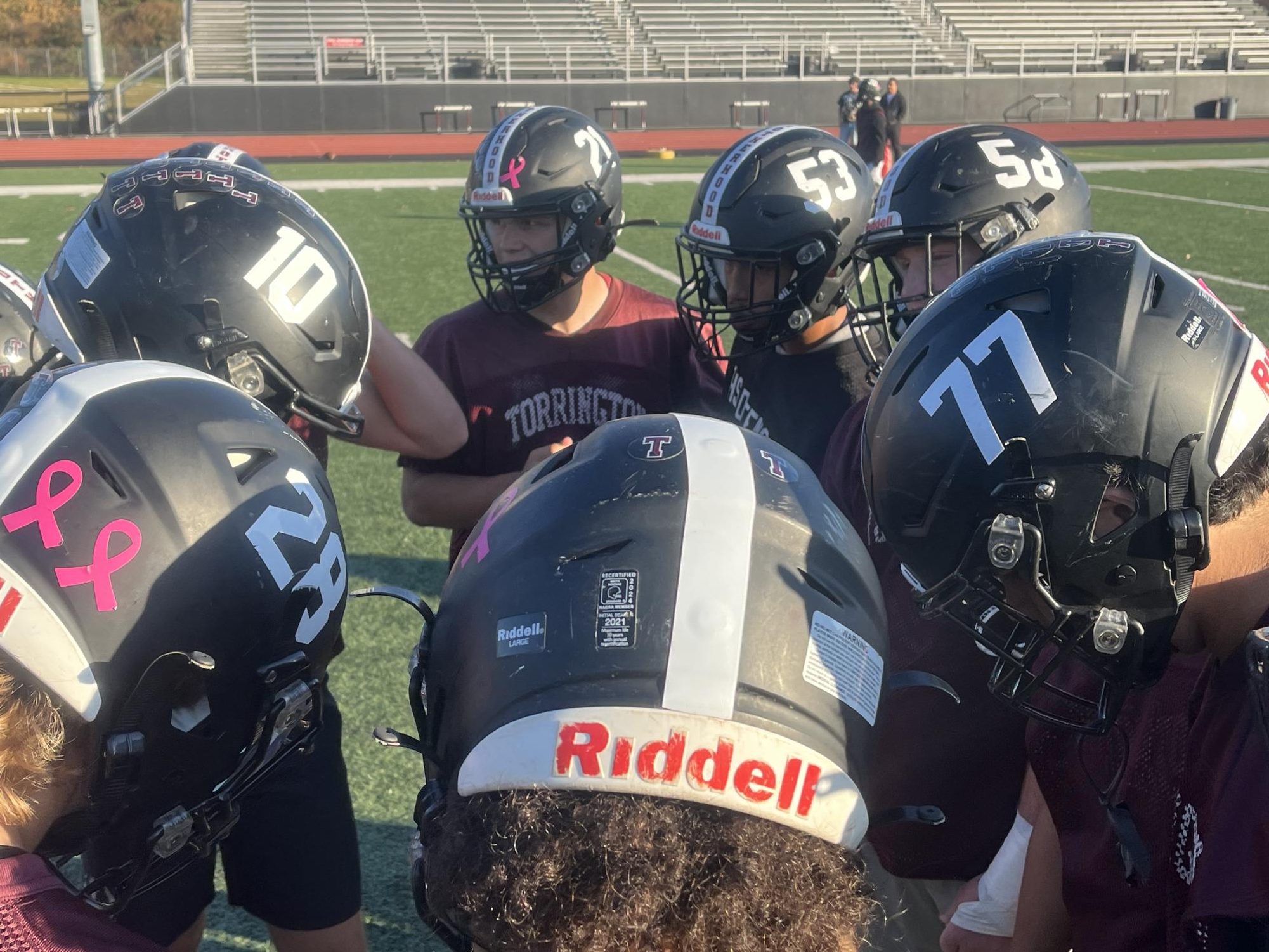 THS Raiders Football in huddle during practice on 10/24. The team is currently 6-0 after Friday's win against WCA.