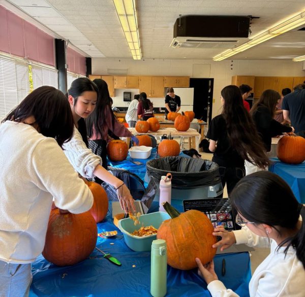 Science Club carving pumpkins. 