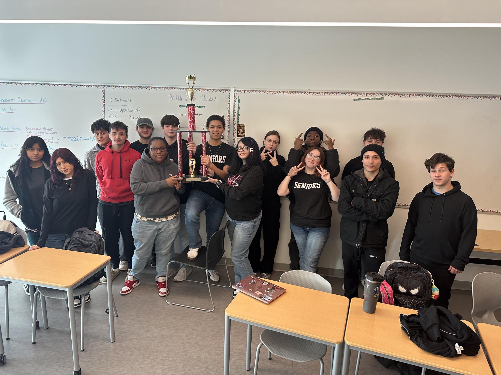 Current seniors won Battle of the Classes in 2024 - and are eager to win again. Here, they take a photo opp with the BOC trophy.