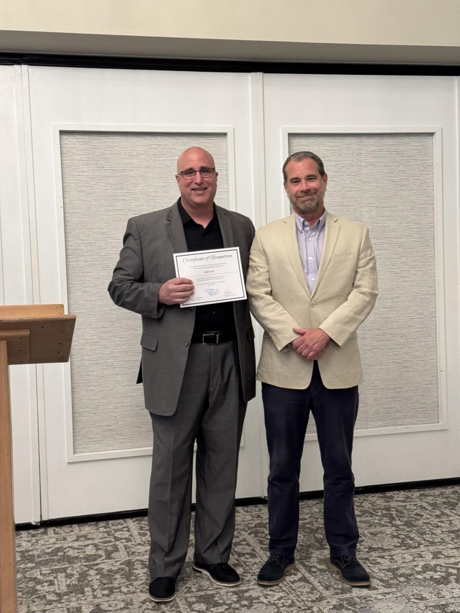 Band Teacher Wayne Splettstoeszer and THS Principal Brian Scott at the CAAA Arts Education Advocates Breakfast on May 8, 2025.