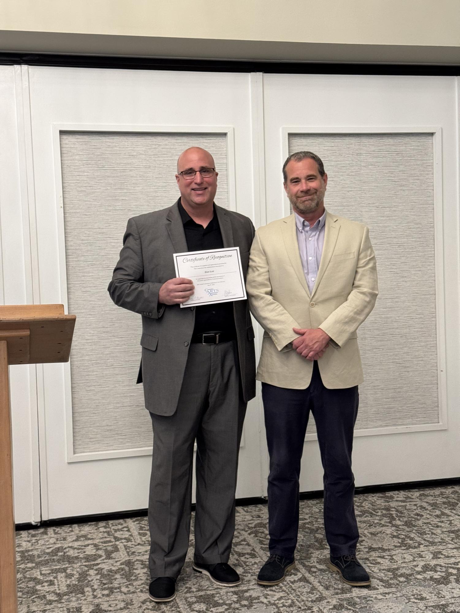Band Teacher Wayne Splettstoeszer and THS Principal Brian Scott at the CAAA Arts Education Advocates Breakfast on May 8, 2025.