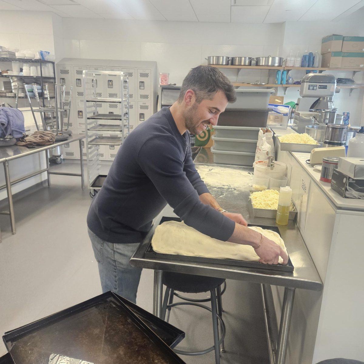 Marzano's owner John Eucalitto prepping pizzas for the event!